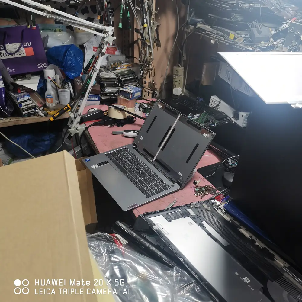KCROC laptop repair workbench used for diagnostics and hardware restoration